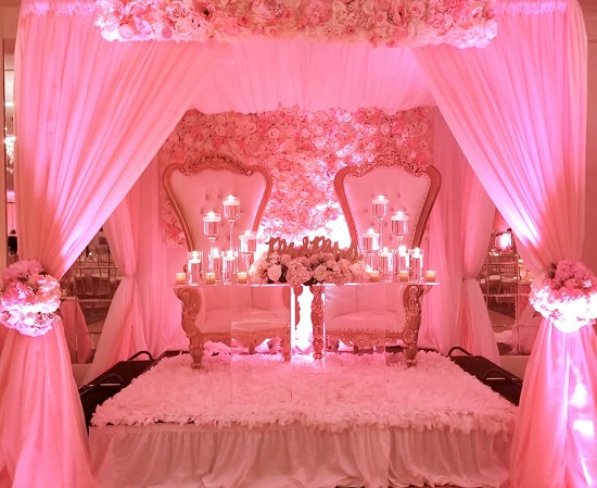 romantic blush wedding bride and groom chairs